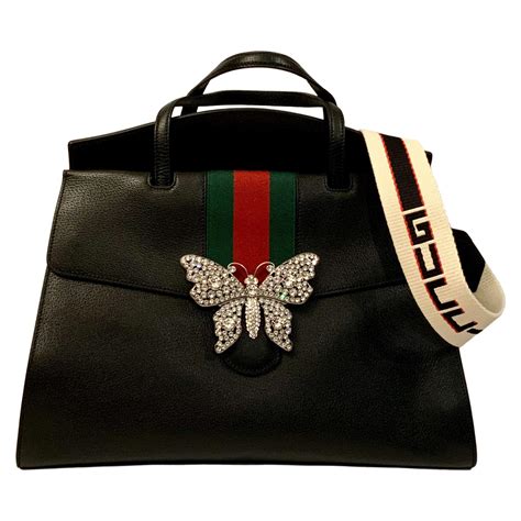 gucci bag raffia|gucci bag with butterfly buckle.